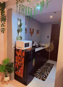 Cozy African Themed Unit in Parañaque
