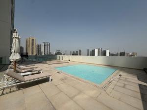Elegant 2BR Apartment with Private Pool in JVC