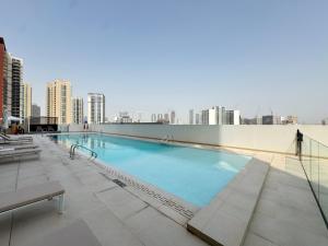 Elegant 2BR Apartment with Private Pool in JVC