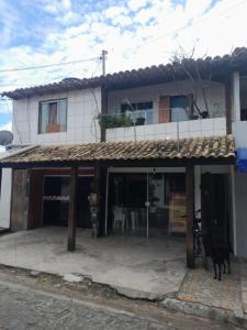 Suíte e cozinha, entrada compartilhada