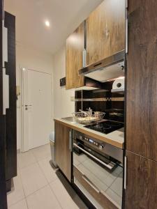 A deux pas de lArc de Triomphe Studio tout équipé