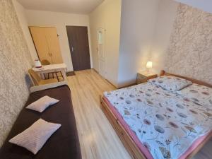 Pokoje Gościnne "Adam"