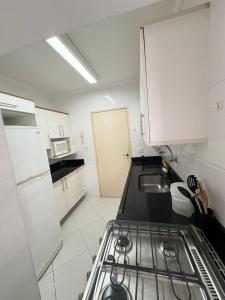 Luizari House - Guarujá Enseada Apartment