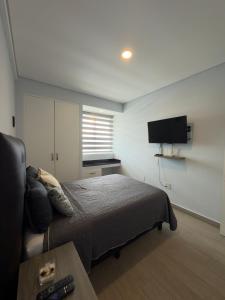 Modern apartment in Zona Real with a view and pool