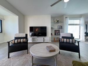 Beautiful Waterfront Condo short walk to the beach your search ends here