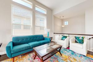 Modern townhome with enclosed yard, private balcony, & WD - near local park