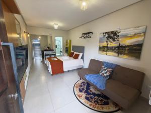 Studio novo com ar condicionado e garagem