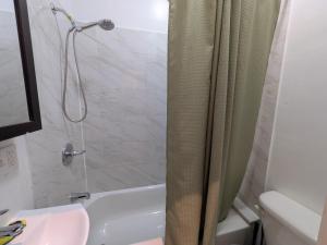 Private Room at a Shared Apartment by Times Square