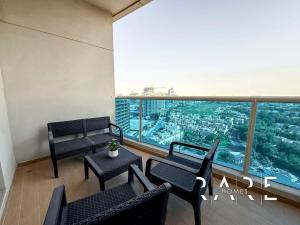 Rare Holiday Homes - Near Miracle Garden - Dubai Sports City - Elite Residence - R1108