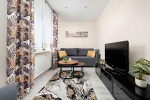 Przytulny Apartament z Biurkiem w Spokojnej Okolicy by Noclegi Renters