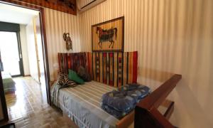 Apartment with pool by the sea