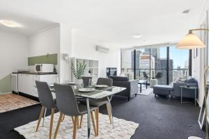 Stunning CBD Penthouse Top-Floor Living with Pool, Gym & Skyline Views
