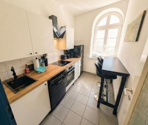Urlaubsmagie Ferienwohnung Fledermaus - Gemeinschaftsgarten mit Sauna - F1B