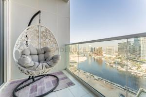 Contemporary 1BR Boho Oasis with Canal Views, Minutes from Downtown Attractions, Reva Residences, Business Bay by Deluxe Holiday Homes