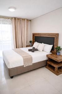 Millennial Apartments, Amplify Living STUDIO- AIRCON, FREE PARKING, 5 MIN WALK TO GATEWAY