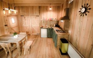 Wooden Lodge Victor de Vos I Slapen in een echte boomhut