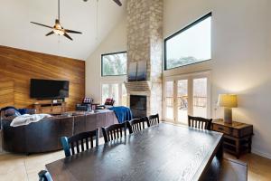 Idyllic waterfront getaway with private hot tub & deck views - near golf