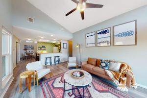 Dog-friendly condo with a gas fireplace, washerdryer, AC, & cable TV