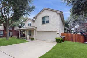 2-story house with back patio, grill, streaming, washerdryer, & 2 living areas
