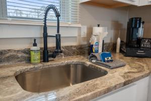 Lakefront Top Floor Condo! Perfect Location!