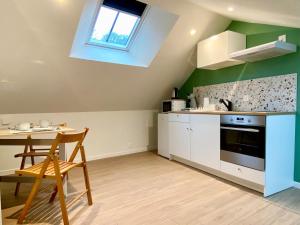 Charmant studio neuf sous les toits