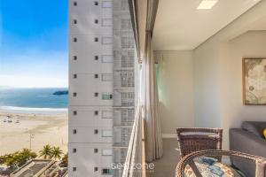Apto c garagem e 2 Quartos a 60m da Praia ACO1103