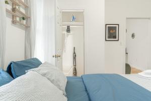 Modern 2BR Retreat with Washer & Dryer - Near Subway & LGA