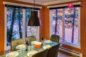 Aux Berges du Pont Suspendu - Chalet Île privée Spa Bord du lac - Estrie