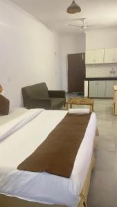 GoBravo Dev Palace & Studio Apartments Near Yashobhoomi Delhi Airport Cyber City