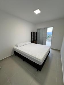 Apartamento em Bertioga com churrasqueira