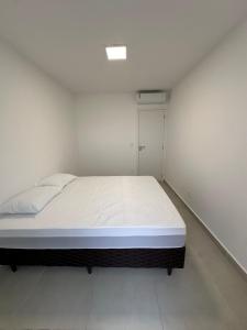 Apartamento em Bertioga com churrasqueira