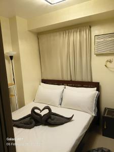 Book CJ at Shore Residences Near Airport & Mall of Asia