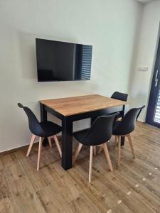 Apartmánové byty s bazénem