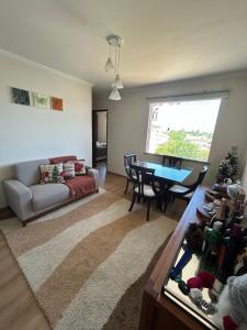 Quarto confortável em apartamento familiar