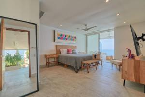 Sunset Getaway with Oceanfront Terrace and Resort Perks