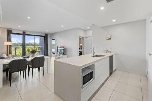 2BR Near Plaza and Garden City Walk to Bus Easy M3