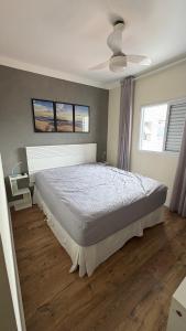 Apto pé na areia em Praia Grande!