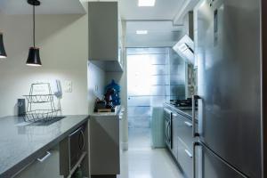 Frente Mar, 60 metros da praia ,ar condicionado