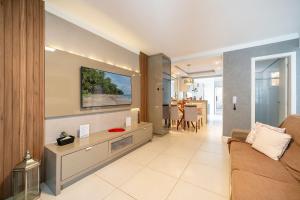 Apto Wave 3Q 800m da praia by Achei Floripa