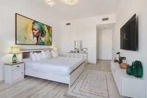 Spacious 2BR Retreat with Balcony in Uptown Mirdif