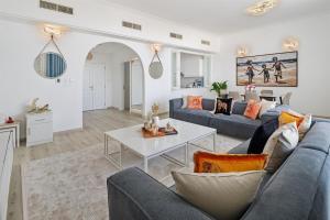Spacious 2BR Retreat with Balcony in Uptown Mirdif