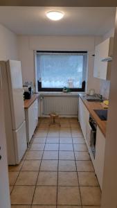 Apartment in Hanglage mit Garten und Balkon