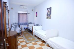 Cozy Host House with 2 air conditioned rooms