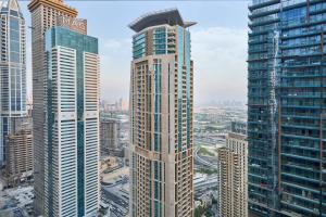 Jumeirah Living Marina Gate - Elegant 1BR Canal View Retreat