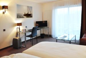 Appart'hotels Golden Tulip Pornic Suites : photos des chambres