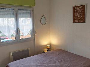 Appartement 3 pièces face à la plage, climatisé, parking sécurisé - FR-1-696-106