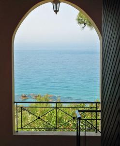 Studio Apartments with large swimming pool and Sea view at Pelekas Beach, Corfu