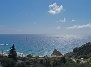 Studio Apartments with large swimming pool and Sea view at Pelekas Beach, Corfu