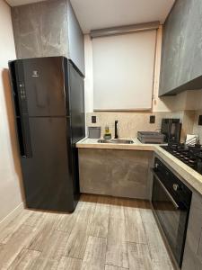 Excelente apartmento em frente à praia