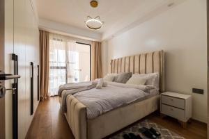 Elegant classy apartment with swimming pool ,fully equipped gym ,child play area and close proximity to shopping malls and great breathtaking views